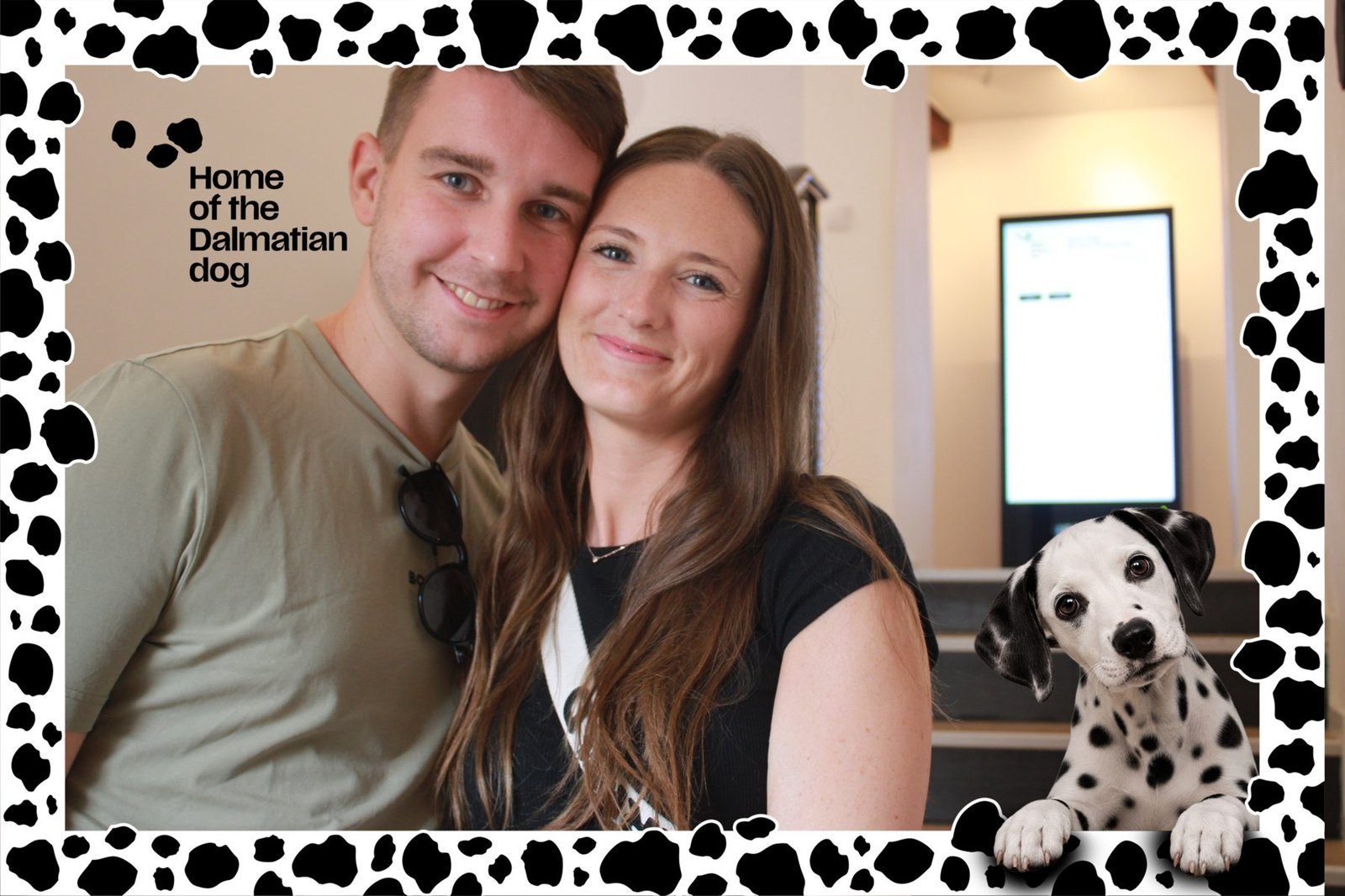 Couple with an AR Dalmatian puppy at the Home of the Dalmatian Dog museum
